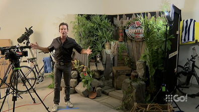 Jeff Probst in his house showing off where he will announce the winner of Survivor Winners at War. 