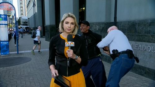 Kriukelis was speaking with the TODAY team when the man was arrested behind her. (9NEWS)