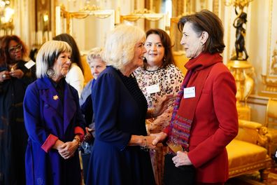 Queen Camilla greets Dame Harriet Walter 