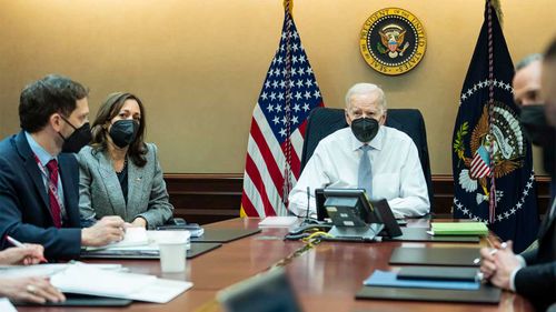 Joe Biden watches the raid that killed the leader of ISIS alongside Vice President Kamala Harris.