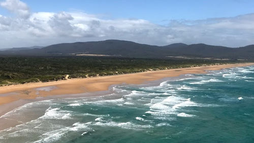 Badger Beach is a "popular location for swimming and line fishing," Tasmania's Parks and Wildlife Service says.