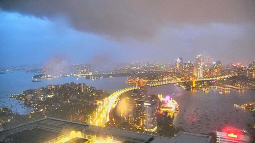 S﻿ydney has been smashed by a wild storm which has cancelled planes and brought down trees.The storm swept through at around 7.30pm after earlier warnings.