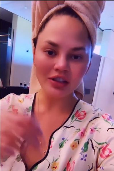 Chrissy Teigen takes her first showers in months.