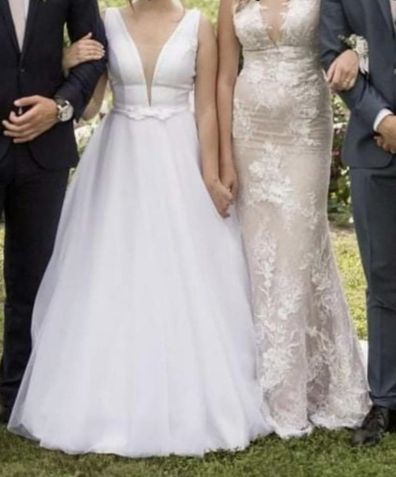 Groom's sister wears wedding dress