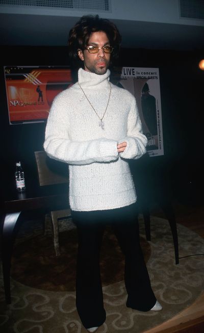 A rare "off-duty" moment: The Artist Formerly Known as Prince reclaims the name 'Prince' and announces public tours at his Paisley Park Studio during a press conference in New York City, 2000.