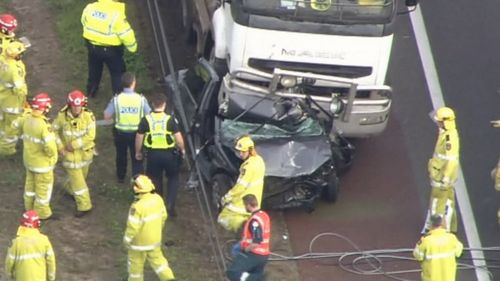 A Hyandai hatchback was completely crushed by the truck, to the point that it was almost split in half. Picture: 9NEWS