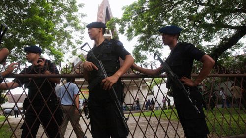 Priest injured in bomb and knife attack at Indonesian church