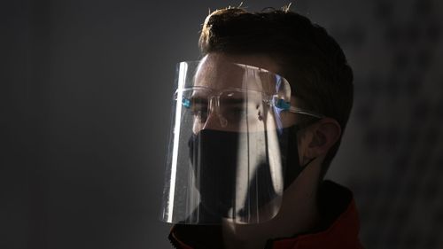 A hosts directs visitors of a COVID-19 testing facility of the Municipal Health Authority GGD, in Utrecht, Netherlands (Photo: December 16, 2020)