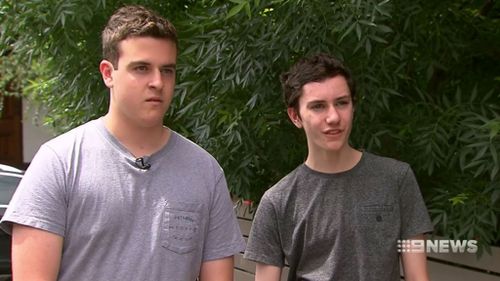 Ethan (left) shoved his friend Andrew (right) out of the way as the white Suzuki four-wheel drive approached them. (9NEWS)