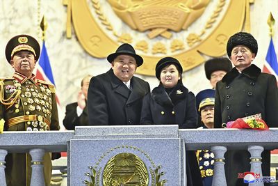 North Korean dictator shows off daughter, missiles at major parade