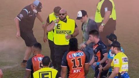 Play was stopped in the Tigers-Sharks game when a protester brought a flare onto the field.