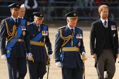 Prince William, Prince of Wales, King Charles III and Prince Harry, Duke of Sussex walk behind the coffin during the procession for the Lying-in State of Queen Elizabeth II on September 14, 2022 in London, England. Queen Elizabeth II's coffin is taken in procession on a Gun Carriage of The King's Troop Royal Horse Artillery from Buckingham Palace to Westminster Hall where she will lay in state until the early morning of her funeral. Queen Elizabeth II died at Balm