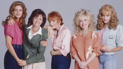 Steel Magnolias actresses Julia Roberts, Sally Field, Shirley MacClaine, Dolly Parton, and Daryl Hannah pose for a portrait in October 1989 in Los Angeles, California. 