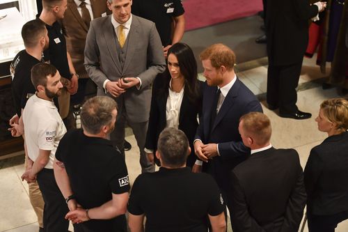 The couple looked comfortable together and Meghan was happy to chat and present awards. Picture: AAP
