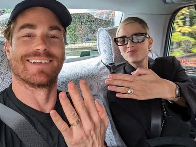 Hayden Quinn with wife Jax showing off their wedding rings.