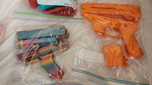 Many of the firearm parts found at the home were printed in different colours.