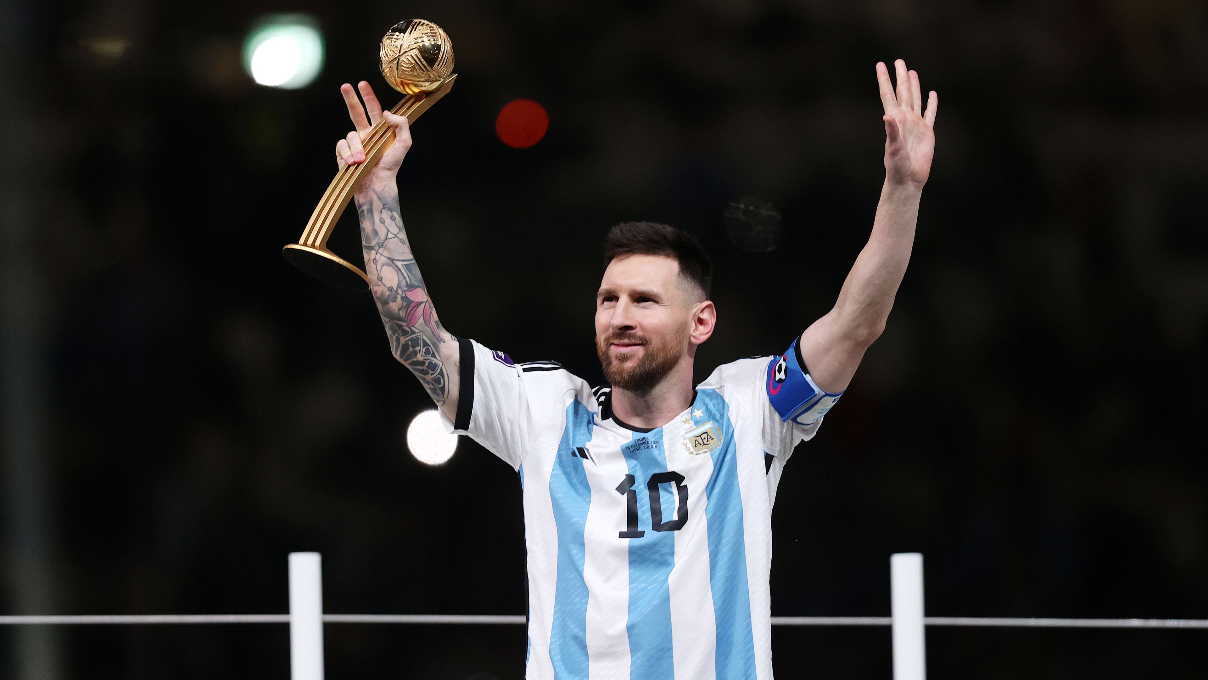 Lionel Messi of Argentina poses for a photo with the adidas Golden Ball after the team&#x27;s victory during the FIFA World Cup Qatar 2022 Final match between Argentina and France at Lusail Stadium on December 18, 2022 in Lusail City, Qatar. (Photo by Julian Finney/Getty Images)