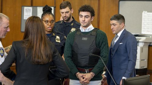 Luigi Mangione, accused of fatally shooting the UnitedHealthcare CEO Brian Thompson in New York City and leading authorities on a five-day search is scheduled, appears in court for a hearing, Friday, Feb. 21, 2025, in New York. (Steven Hirsch/New York Post via AP, Pool)