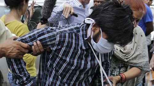 Puneet Puneet walks into court in New Delhi in 2005. (AAP)