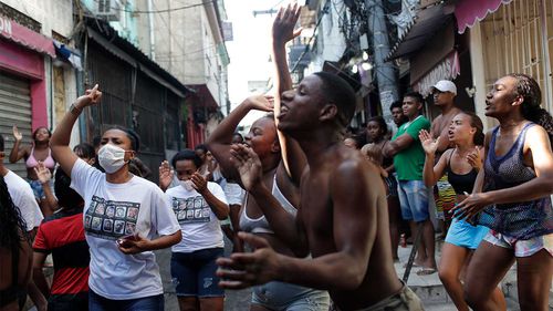 Residents in the Jacarezinho favela of Rio de Janeiro protesting violence at the hands of police.