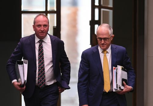 Malcolm Turnbull and Deputy Prime Minister Barnaby Joyce enter parliament for question time yesterday. (AAP)