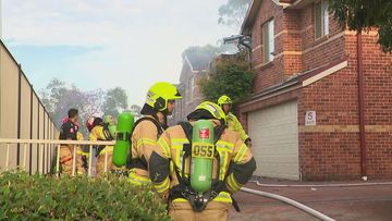 Firefighters have battled a blaze that tore through a Sydney home in Auburn.