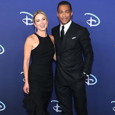 Amy Robach and TJ Holmes attend the 2022 ABC Disney Upfront at Basketball City - Pier 36 - South Street on May 17, 2022 in New York City.