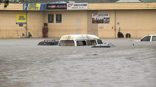 Floodwater inundate cars  on March 30, 2022 in Lismore, Australia. Evacuation orders have been issued for towns across the NSW Northern Rivers region, with flash flooding expected amid  heavy rainfall.