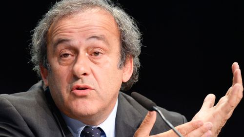 UEFA president Michael Platini said he asked Sepp Blatter to step down.(AAP)