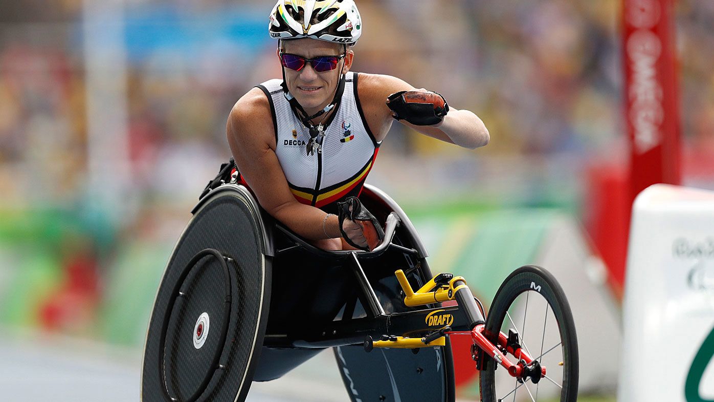 In this Sept. 10, 2016, file photo, Belgium&#x27;s Marieke Vervoort warms up for the athletics women&#x27;s 400-meter T52 final, during the Rio 2016 Paralympic Games