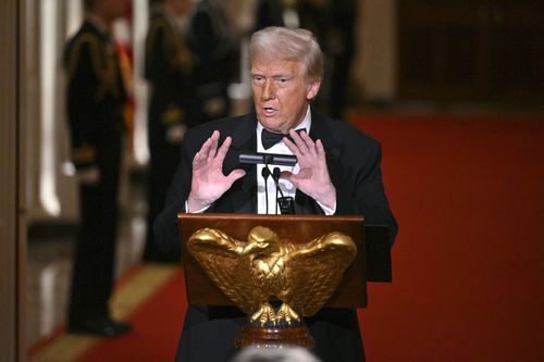 President Donald Trump addresses the National Governors Association dinner and reception in the East Room of the White House Saturday, Feb. 22, 2025, in Washington. (Pool via AP)
