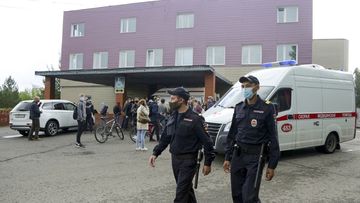 Police patrol an area, as journalists gather at the Omsk Ambulance Hospital No. 1, intensive care unit where Alexei Navalny was hospitalised in Omsk, Russia (Photo: August 21, 2020)