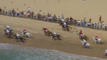 The iconic Magic Millions race day has kicked off on the Gold Coast but not everyone was enjoying their time on the sand.