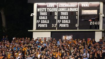 Fans watch on during the round three NRL match between Wests Tigers and Cronulla Sharks at Leichhardt Oval. 