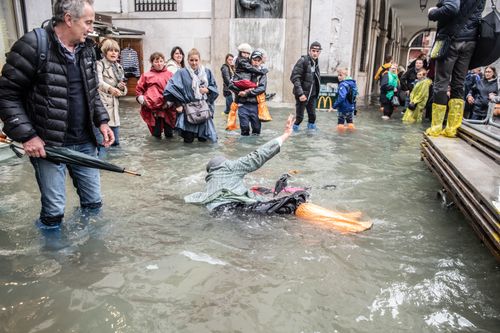 Parts of Venice are also completely submerged in water as floodwaters rise.