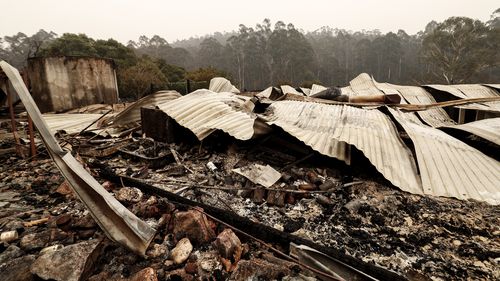 A burnt down house is seen on a property in the Cann Valley in East Gippsland.