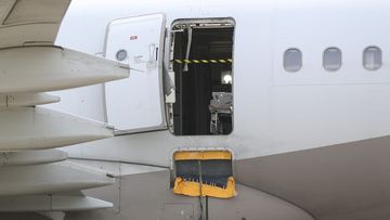 An Asiana Airlines plane is parked as one of the plane&#x27;s doors suddenly opened at Daegu International Airport in Daegu, South Korea, Friday, May 26, 2023. 