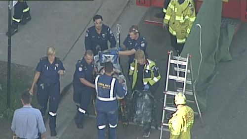 He was operating a scissor lift. (9NEWS)