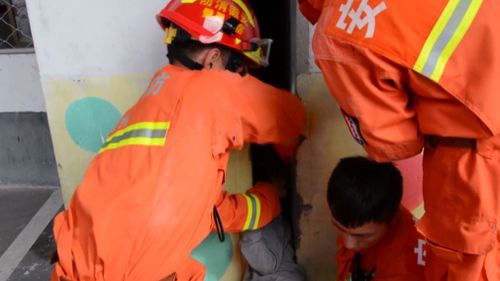 Firefighters were forced to use sandpaper and oil to free the stuck girl. (Reuters)