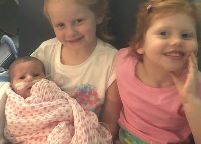 Molly finally went home to Kincumber last month to join sisters Ella, four and Sophie, two, after 55 days in hospital,