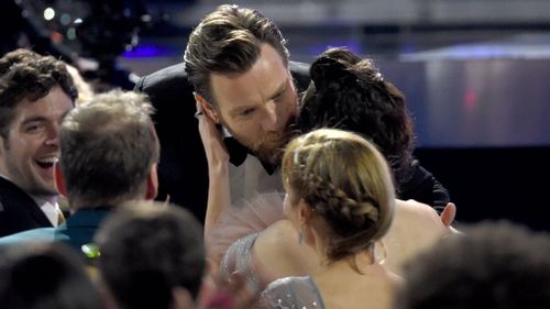 McGregor kissing new flame Mary Elizabeth Winstead after being awarded a Critics' Choice for his performance in Fargo. (Image: AP)