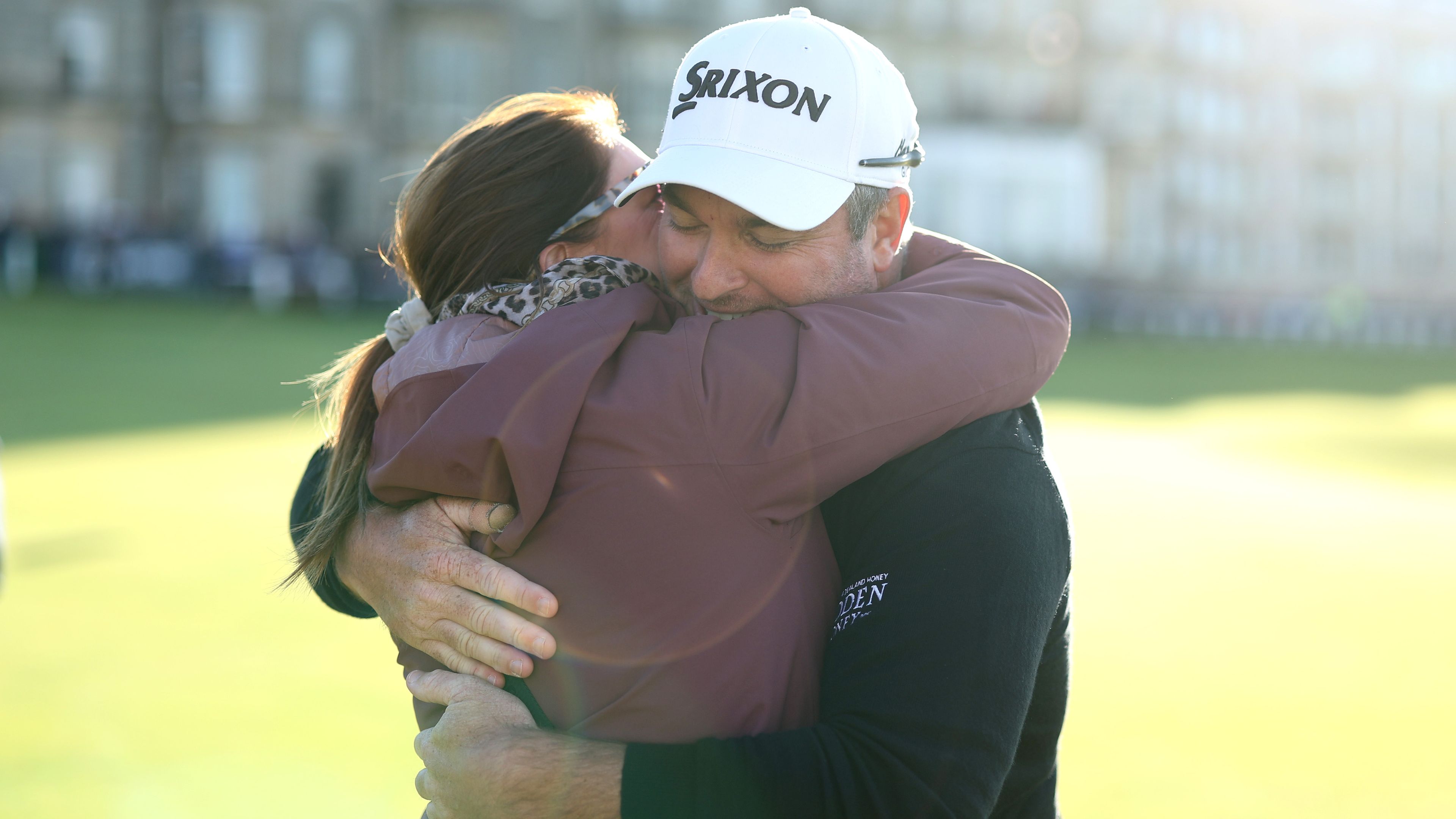 Ryan Fox of New Zealand embraces his wife, Anneke, after winning the Alfred Dunhill Links Championship on the Old Course St. Andrews.