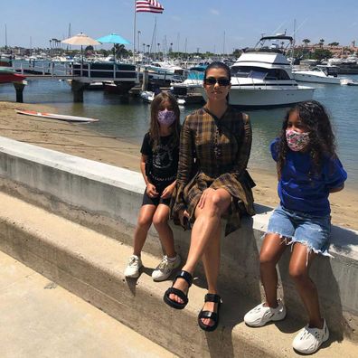 Kourtney Kardashian with her two younger children Penelope and North.