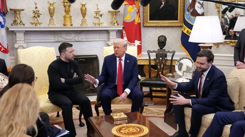 US President Donald Trump (C) and Vice President JD Vance meet with Ukrainian President Volodymyr Zelenskyy in the Oval Office.
