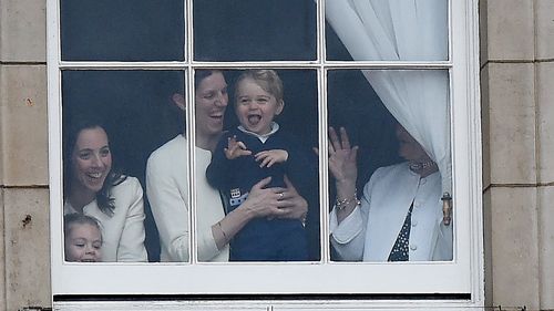 Prince George watched the beginning of the parade from a window with his nanny. (AAP)
