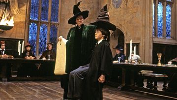 A scene from Harry Potter and the Philosopher&#x27;s Stone featuring the sorting hat at Hogwarts