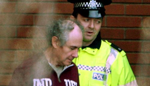 John Darwin during his 2007 arrest by UK police. (AAP).