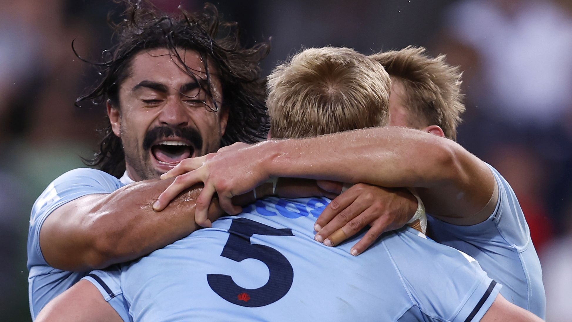 Hugh Sinclair of the Waratahs celebrates a try during the round two Super Rugby Pacific match against the Crusaders.