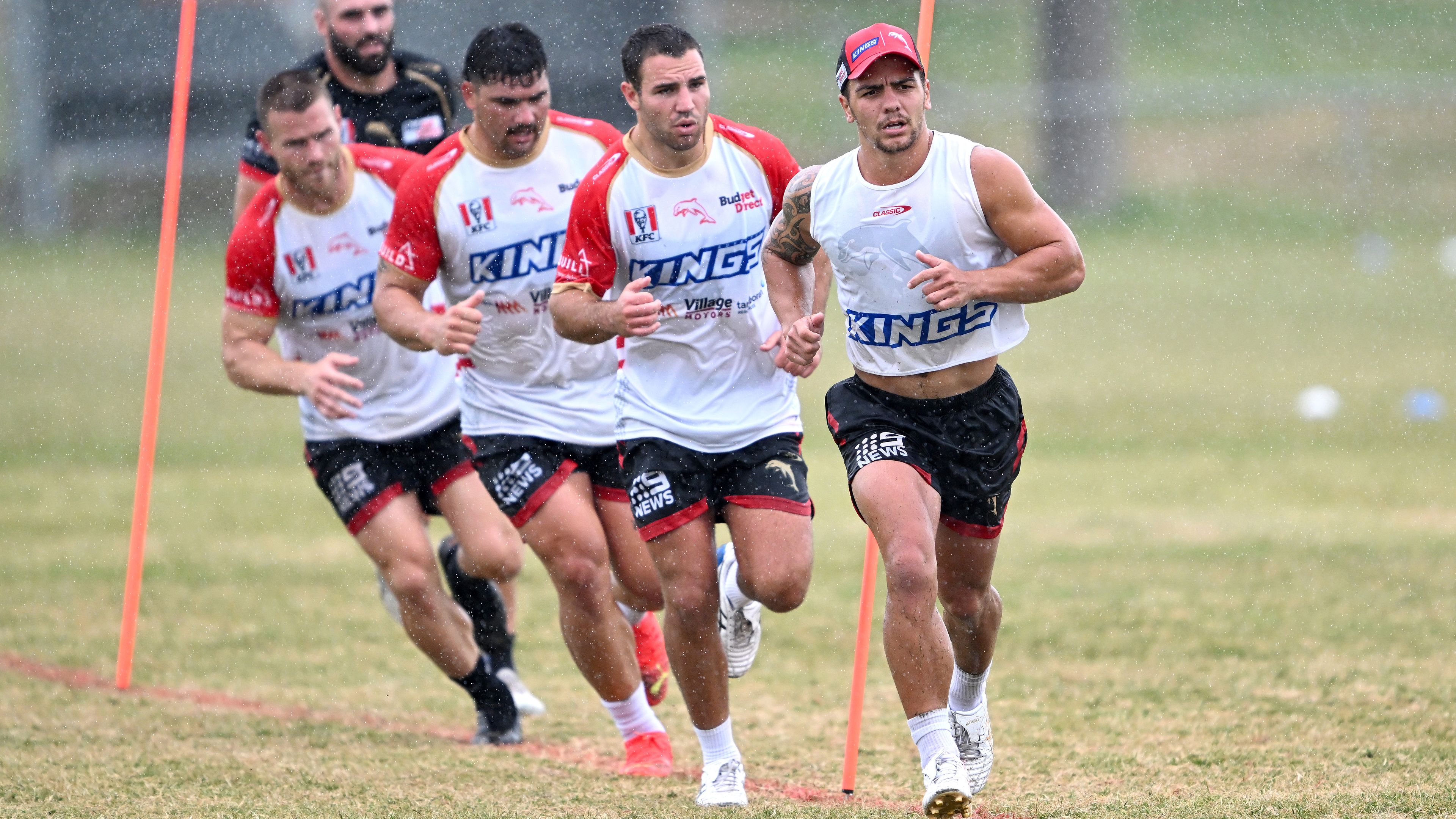 Kodi Nikorima and Sean O&#x27;Sullivan lead the way during a training drill at a Dolphins NRL training session. (Photo by Bradley Kanaris/Getty Images)