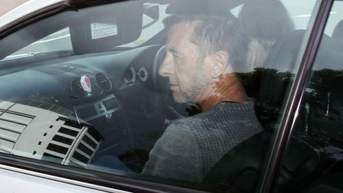 AC/DC drummer Phil Rudd leaves Tauranga District Court on November 6. (Getty)